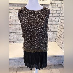 Vintage dress with gold mesh overlay.